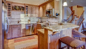 Kitchen with wooden counters and a dishwasher in our Steamboat Springs vacation condo
