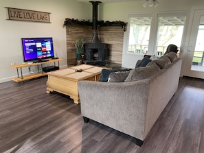 Cozy Living room with gas fireplace for the cold months and Roku enabled TV