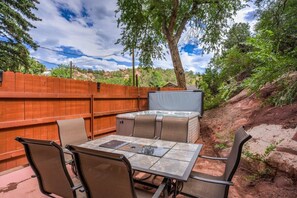 An exceptional outdoor living space with HOT TUB!