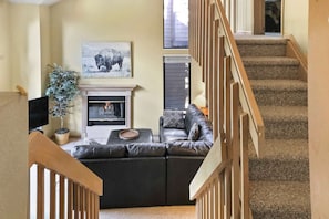 View from Mid-Level Queen Bedroom and Hall/Master Bath to Living Room