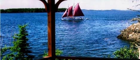 VIEWS FROM INSIDE THE SCREENED IN GAZEBO. AMAZING BLUE WATERS OF THE ATLANTIC