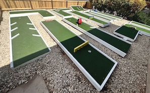 Private mini golf course at the house.