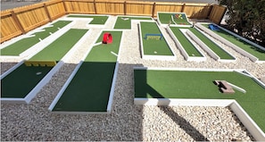 Private mini golf course at the house.