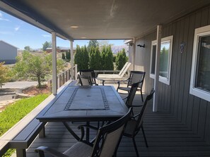 Enjoy dinner on the back deck over looking the pool and view of golf.