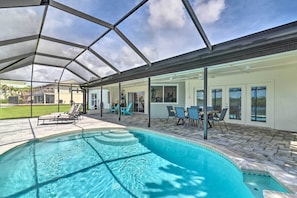 Sit in the lanai of this vacation rental and sip a cold glass of sweet tea!