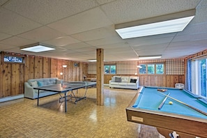 Challenge someone to a game of pool or ping pong in the game room.