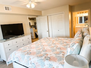 Primary bedroom has its own private bathroom connected to the room & TV