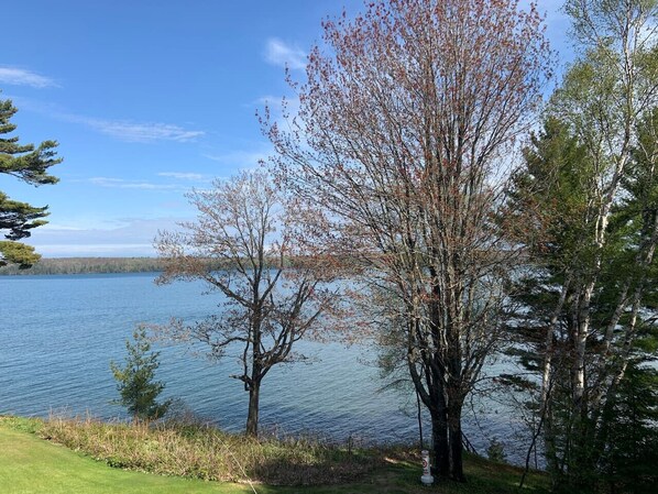 Enjoy stunning views of the Apostle Islands and Lake Superior off your private balcony. Access a small sand beach just a few steps down to the shore.