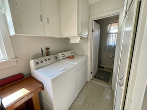 Laundry room with laundry soap provided 