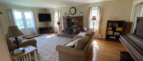 Living room with 2 full size sofas.
