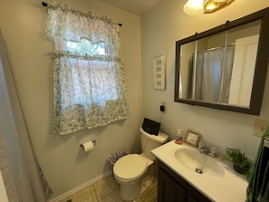 Full downstairs bathroom off of laundry room