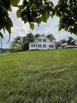 Large early 20th century farmhouse.  Site of Cokes Chapel Antiques abound