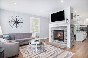 Open view of living room fireplace