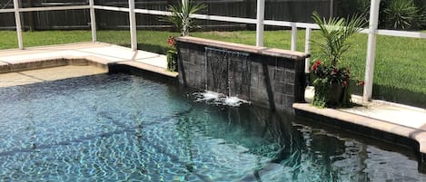 Large pool with sun deck ledge