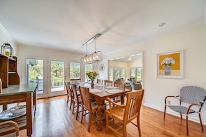 Dining room with buffet for group meals. Set for 8 but can pull in extra seating