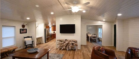 "Living Room: 65""Smart TV with Dish Network"