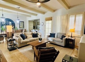 Relax in style. Living room couch converts to a queen-sized sleeper sofa.