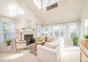 Main Living Area, with beautiful white wood floors, 20 foot vaulted ceiling