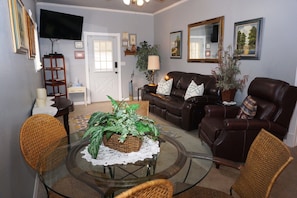 Living room and entry door.