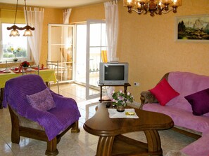 Table, Picture Frame, Couch, Property, Furniture, Comfort, Houseplant, Living Room, Purple, Wood