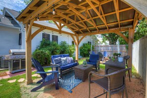 Gather with friends under the gazebo outside.