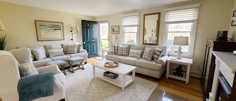 Living room with comfortable seating and flat screen TV