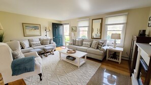 Living room with comfortable seating and flat screen TV