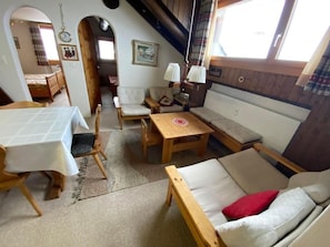 View from the bathroom to the living room and the two bedrooms