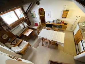 View of the living room and kitchen from the gallery / mezzanine