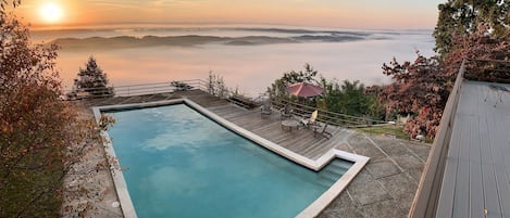 Sunrise view from upstairs porch.  3 upstairs bedrooms open to this area. 