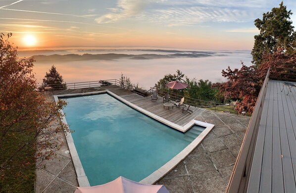 Sunrise view from upstairs porch.  3 upstairs bedrooms open to this area. 