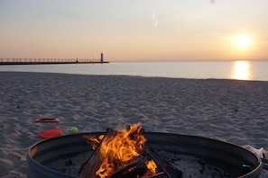 Sunset bonfire at 5th Avenue Beach.