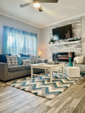 Living room
With queen sofa bed couch and fireplace