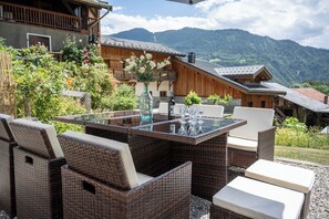 Outside dining with mountain views.