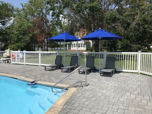 Pool with view of main house and Church Creek in the background.