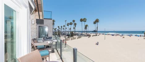 View of the glorious Newport Beach (and pier area beyond) from your front deck.