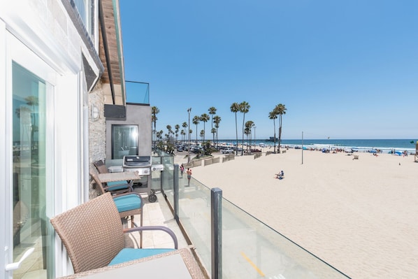 View of the glorious Newport Beach (and pier area beyond) from your front deck.