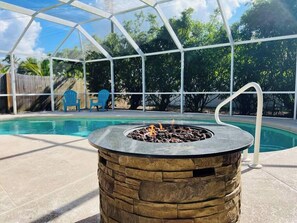 Unwind by the private heated pool