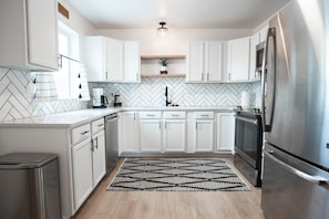 Kitchen with stainless appliances.
