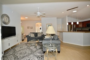 Open and bright floor plan.
Kitchen cabinets have since been painted white