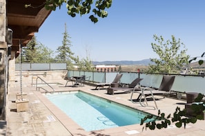 Relax at Lowell with chaise lounges poolside