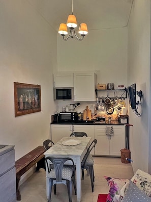 Kitchen dining area with sofabed chair (sleeps one)