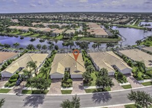 Front Aerial View of the Villa with a 2 Car Garage