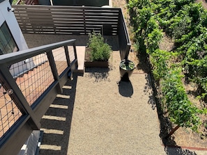 Private courtyard with grill.