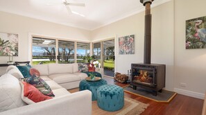 Lounge room with wood fireplace