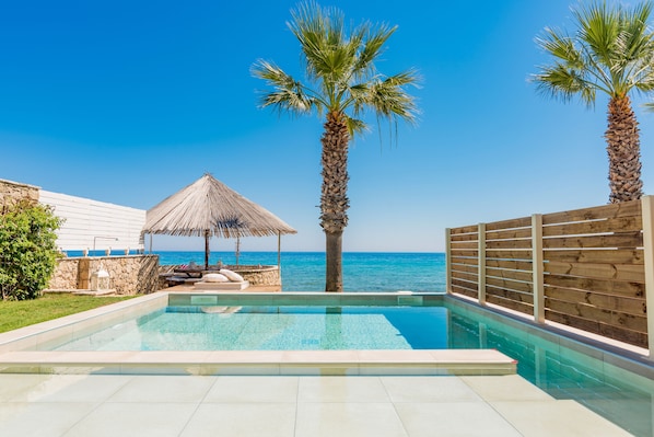 Uranus Deluxe SeaFront Villa, has access to a Private Beach Area. 