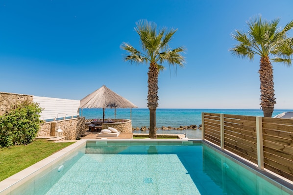 Sophisticated pool surroundings offering a sense of tranquility. 
