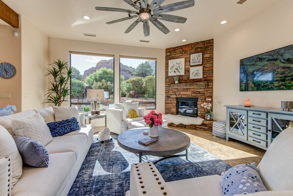 Comfortable Living Room with a Gas Fireplace, 65" Smart TV and Great Views