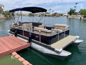 Fishing sunbathing or sunset cruises in your own pontoon boat on a private lake.