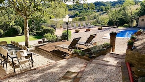 outdoor dining and lounging by the pool